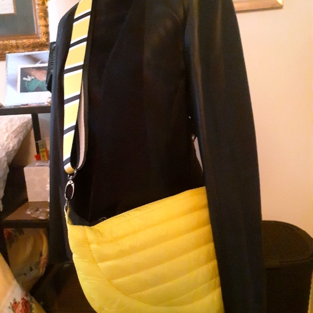 Crossbody puffer bag with multi designed shoulder straps by Think Royln